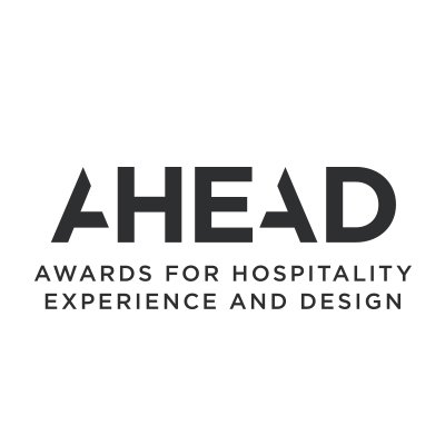 ahead awards and sleeper magazine awards logo - black type overlays a white backdrop