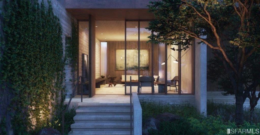 rendering of a modern townhouse entryway with lush greenery and a modern, concrete staircase in the forefront